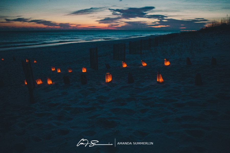 florida beach destination wedding sunset with paper bag luminaries