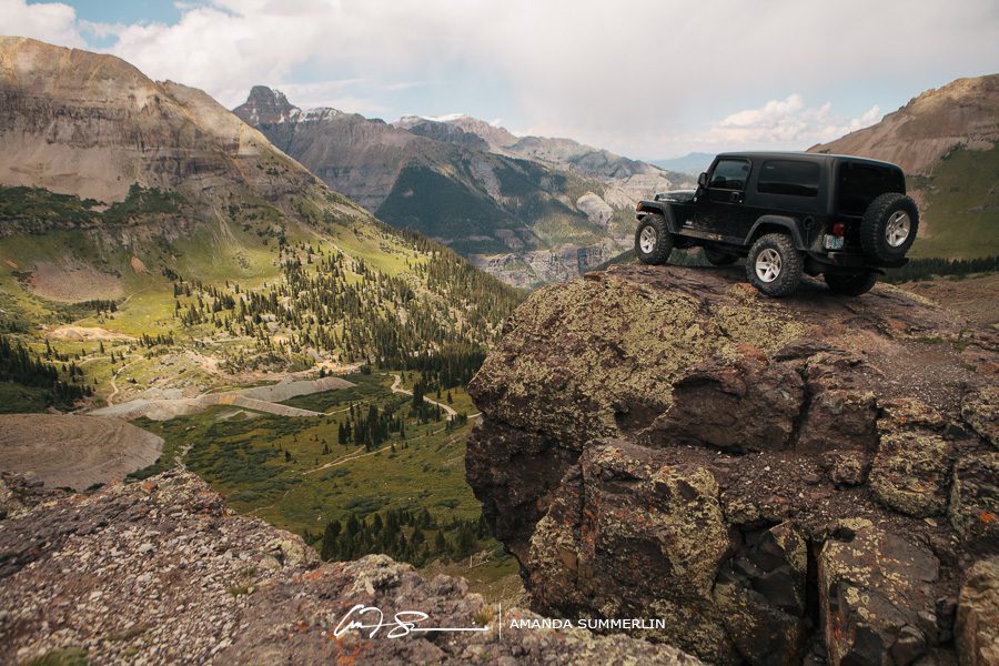 picture of jeep wrangler overlooking trail below