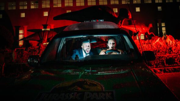 dramatic reenactment of a jurassic park movie scene for a wedding at Fernbank museum in Atlanta