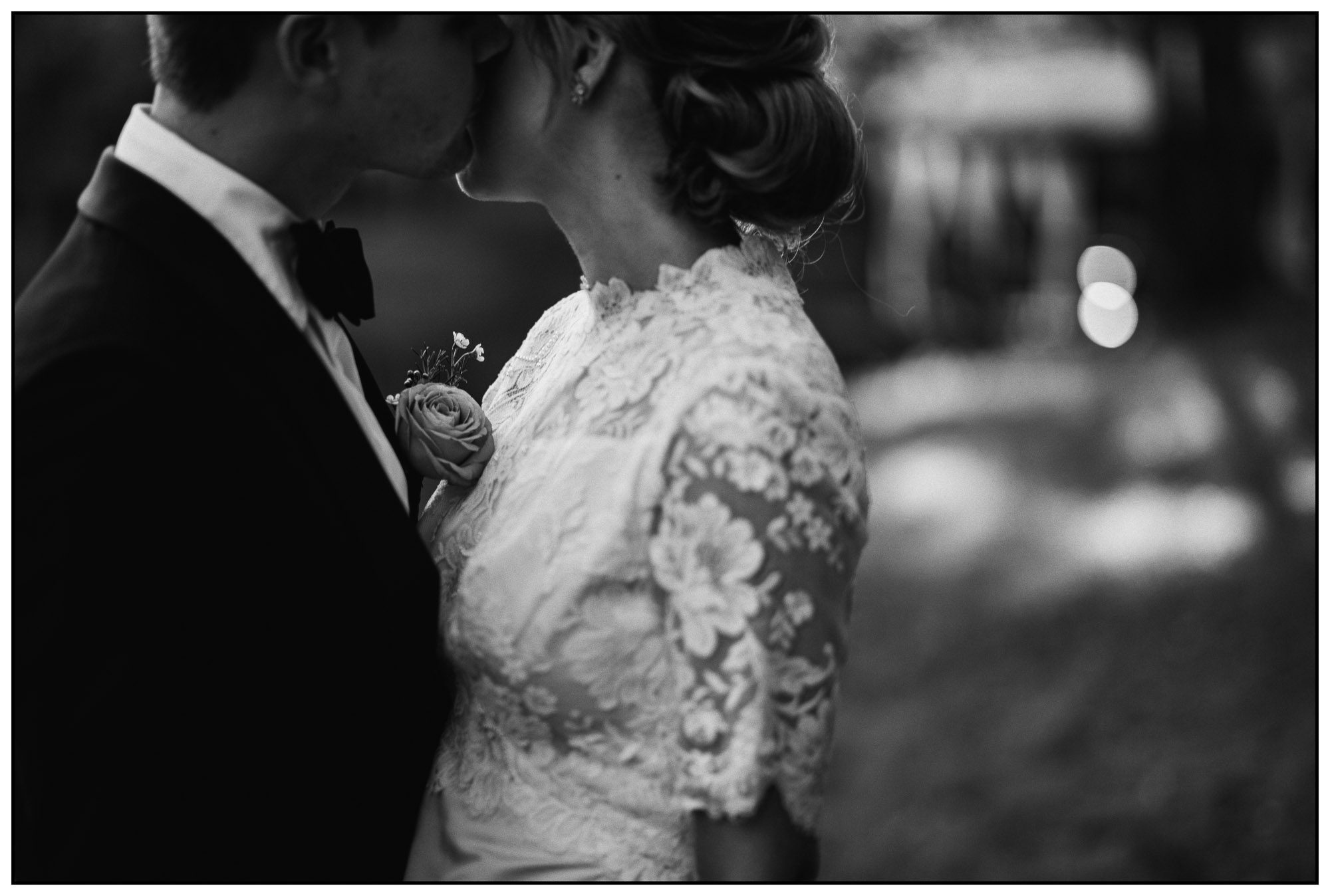 black and white photo of a bride and groom embaracing after their intimate atlanta wedding ceremony