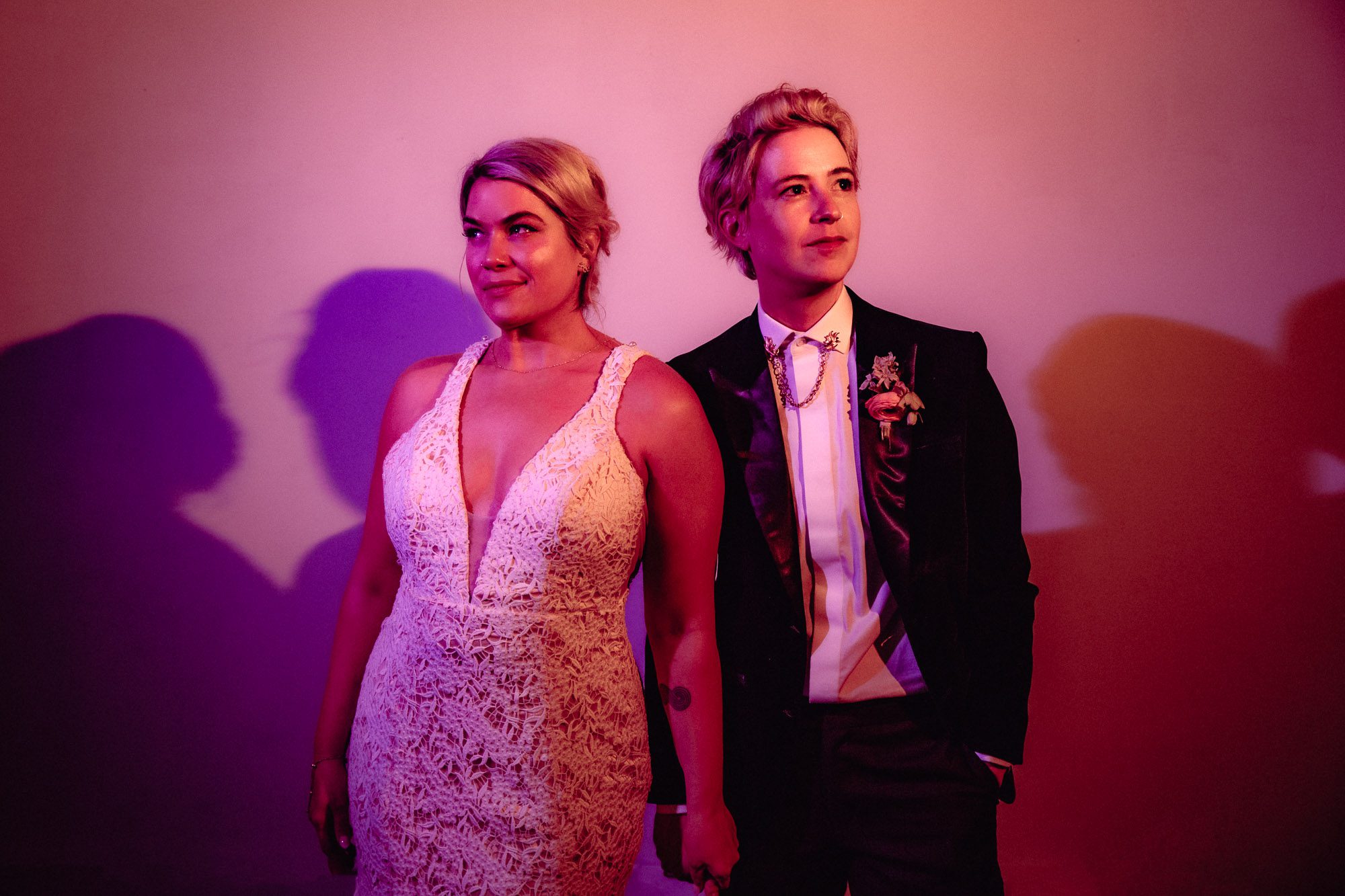 creatively lit lgbtq wedding portrait at westside warehouse