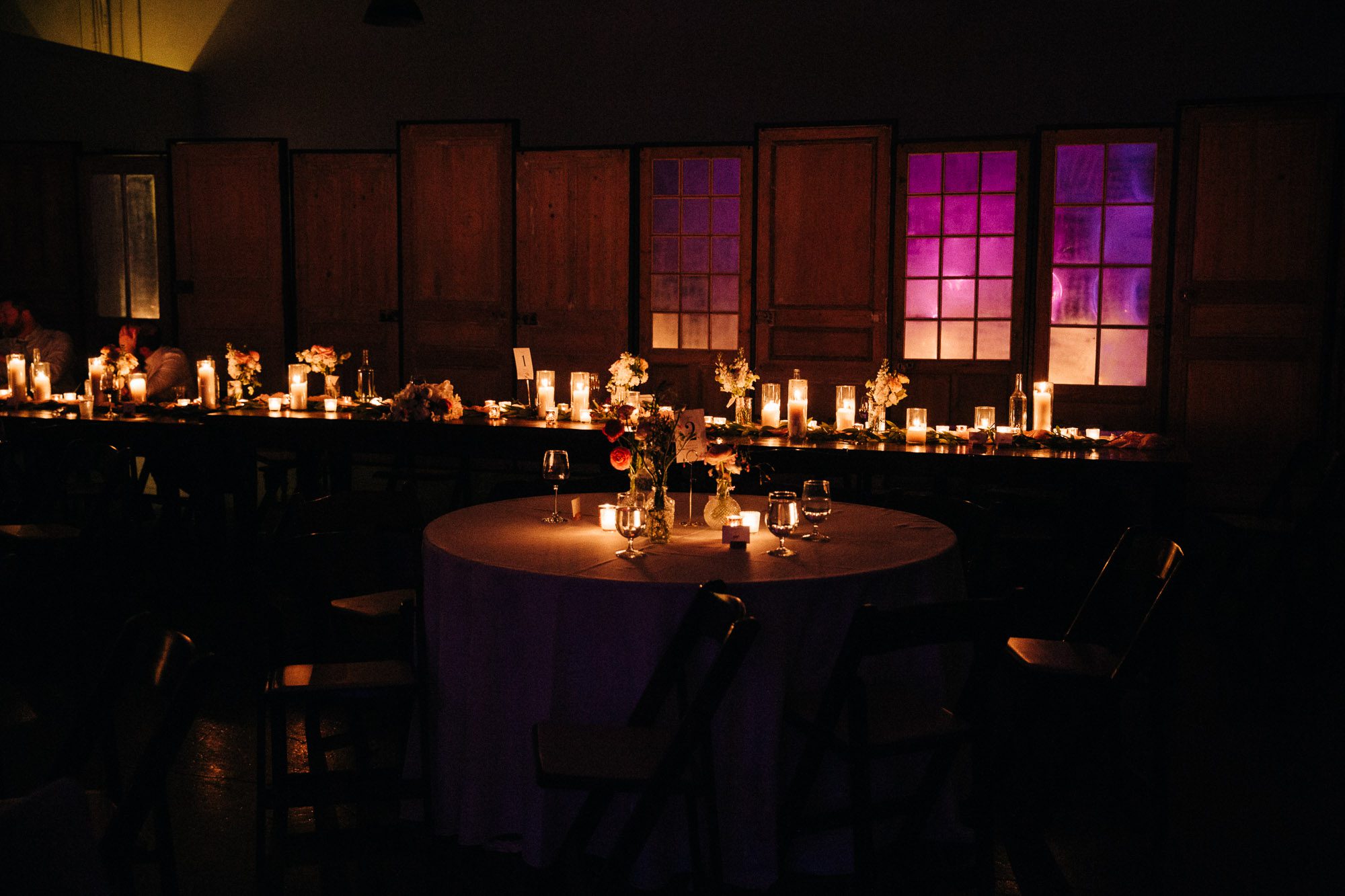 candlelit wedding reception at westside warehouse in atlanta