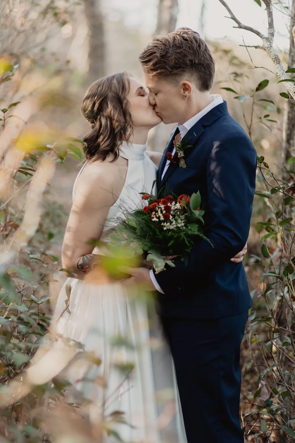 a newly married couple embraces after their cloud land canyon wedding ceremony in north georgia